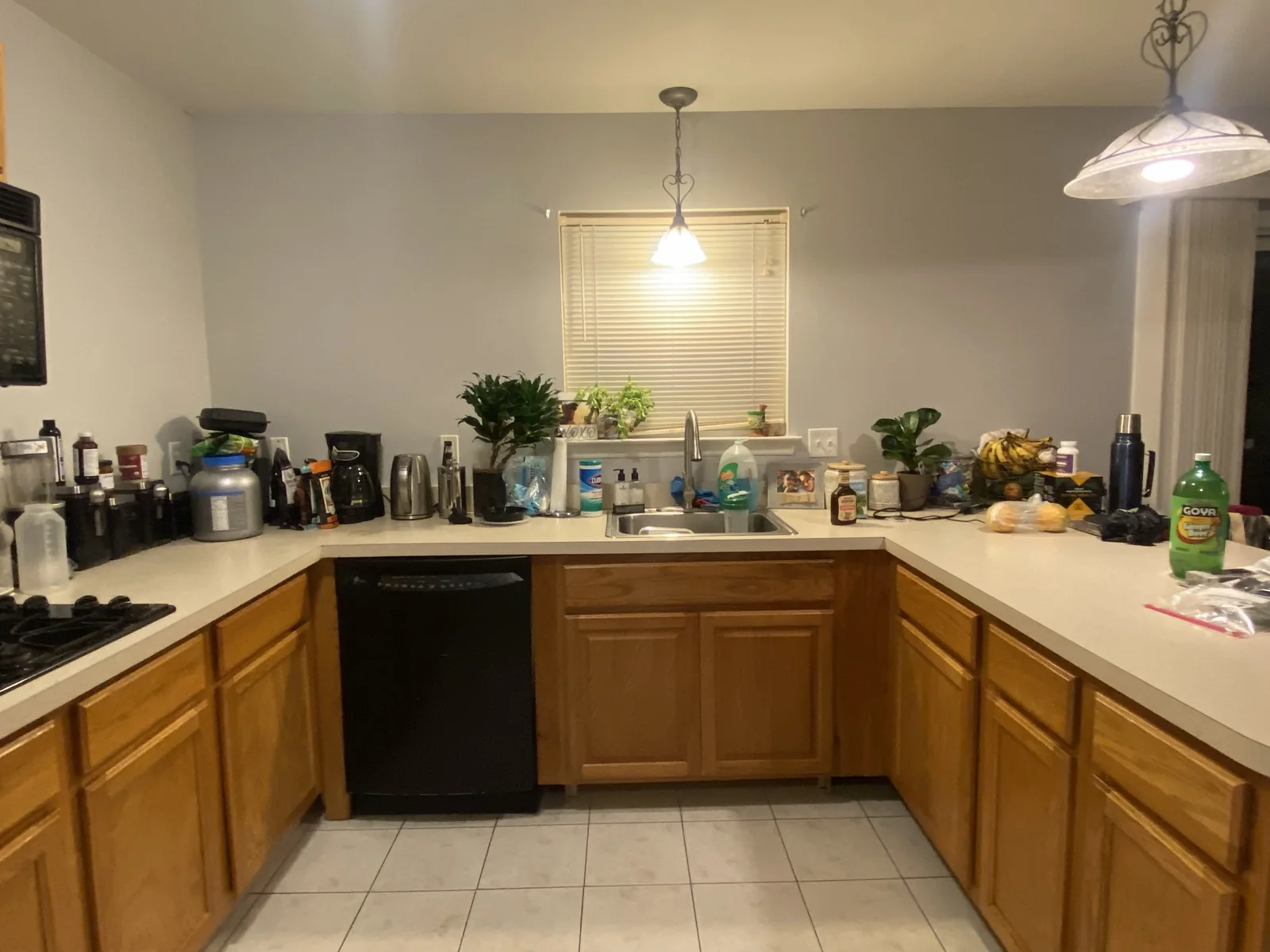 Earlier wood cabinetry before the grey kitchen renovation